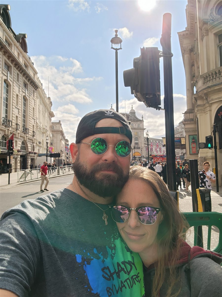Mike Ahern and his wife taking a selfie on a London street